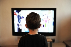 child watching TV